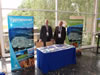 TAC booth at Budapest 2009 - President Rick Staples (Left) TAC2010 Chair Dean Brox (Right)
